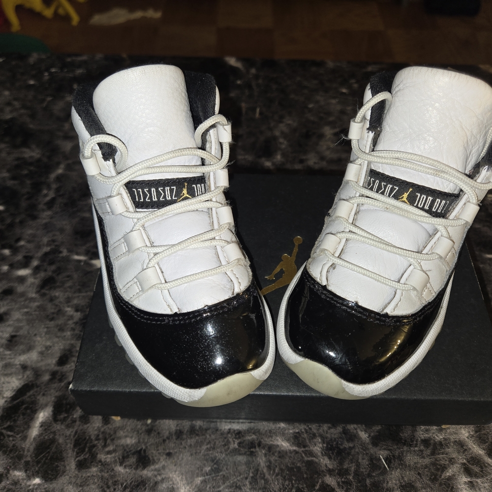 Jordan 11 Kids Black and White Sneakers